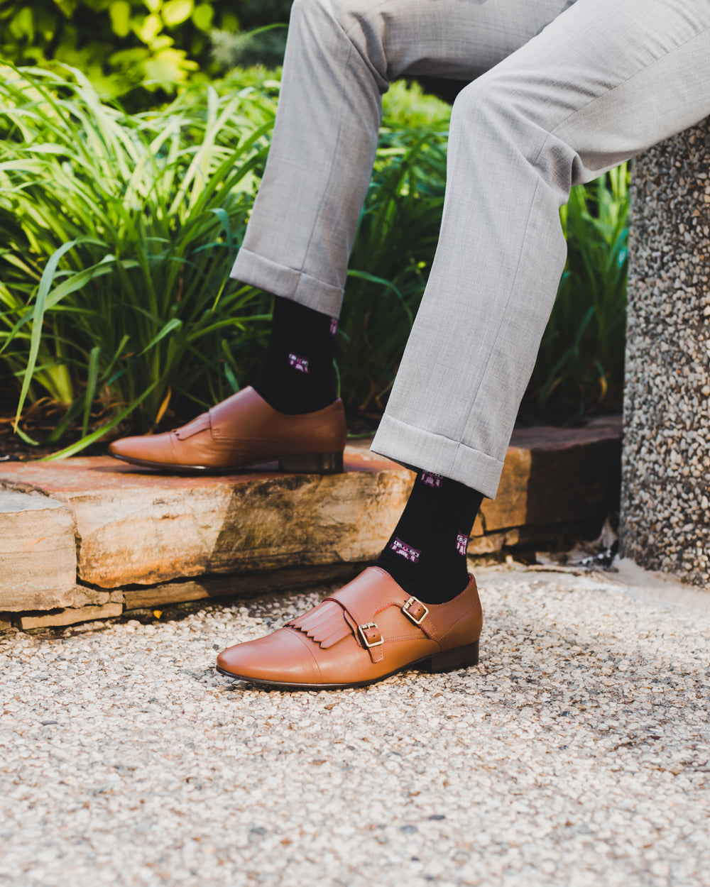 black over the calf dress socks with owl prints, light brown dress shoes, grey dress pants