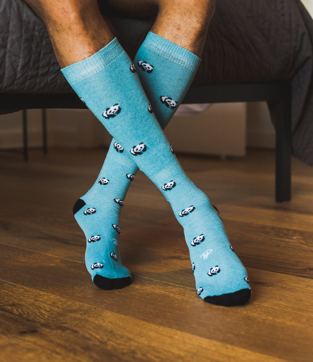 light blue over the calf dress socks with panda prints and black toe and heel