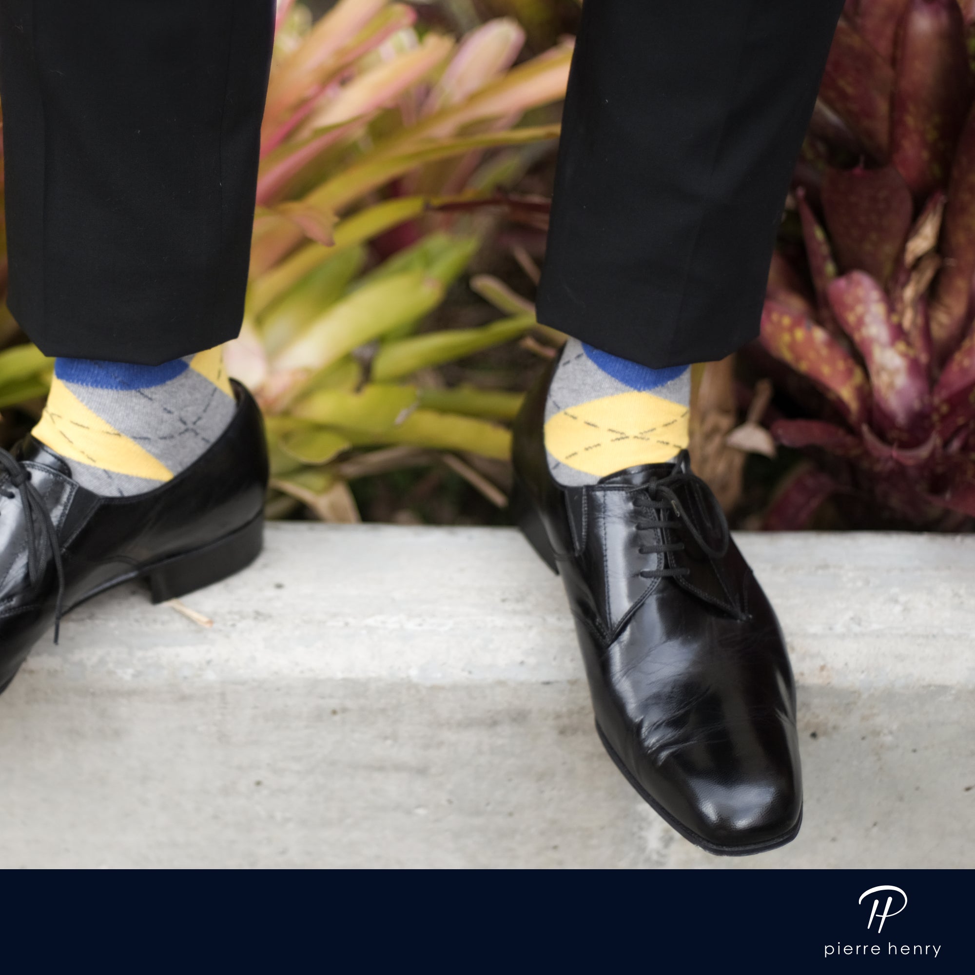 light grey blue and yellow argyle over the calf dress socks, black dress shoes, black dress pants