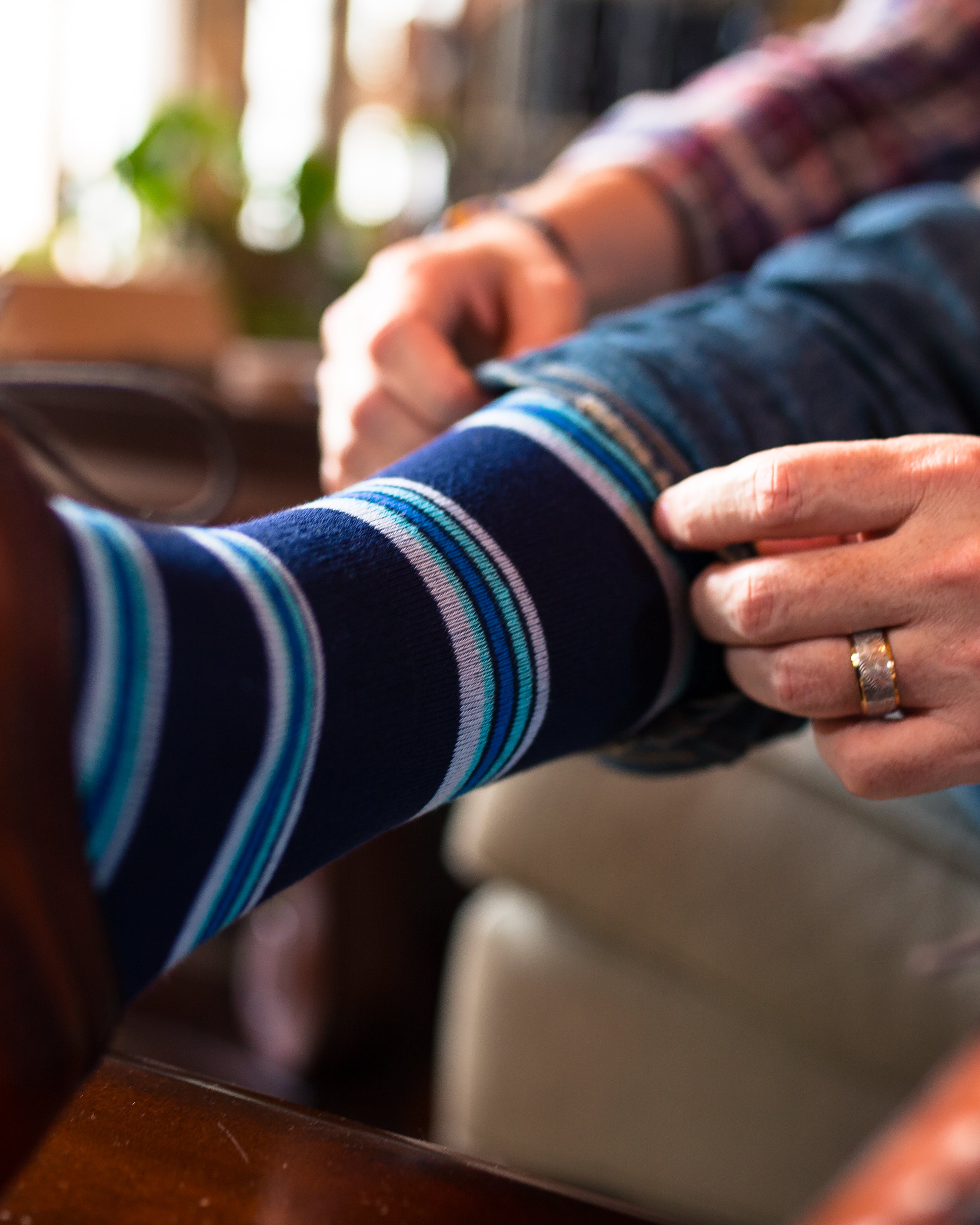 navy blue over the calf dress socks with light blue light pink and blue stripes, blue jeans