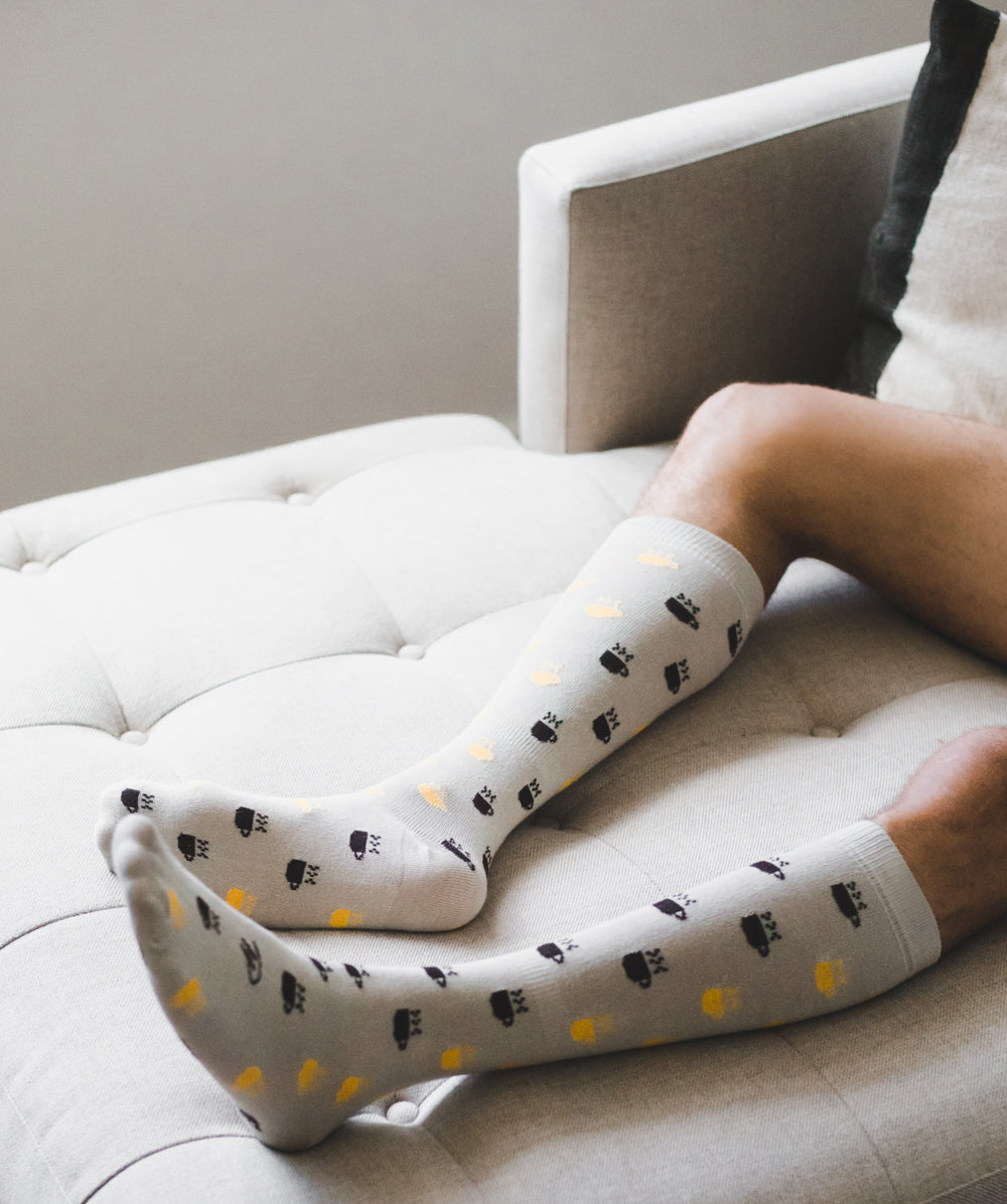 light grey over the calf dress socks with black and yellow hot mug prints