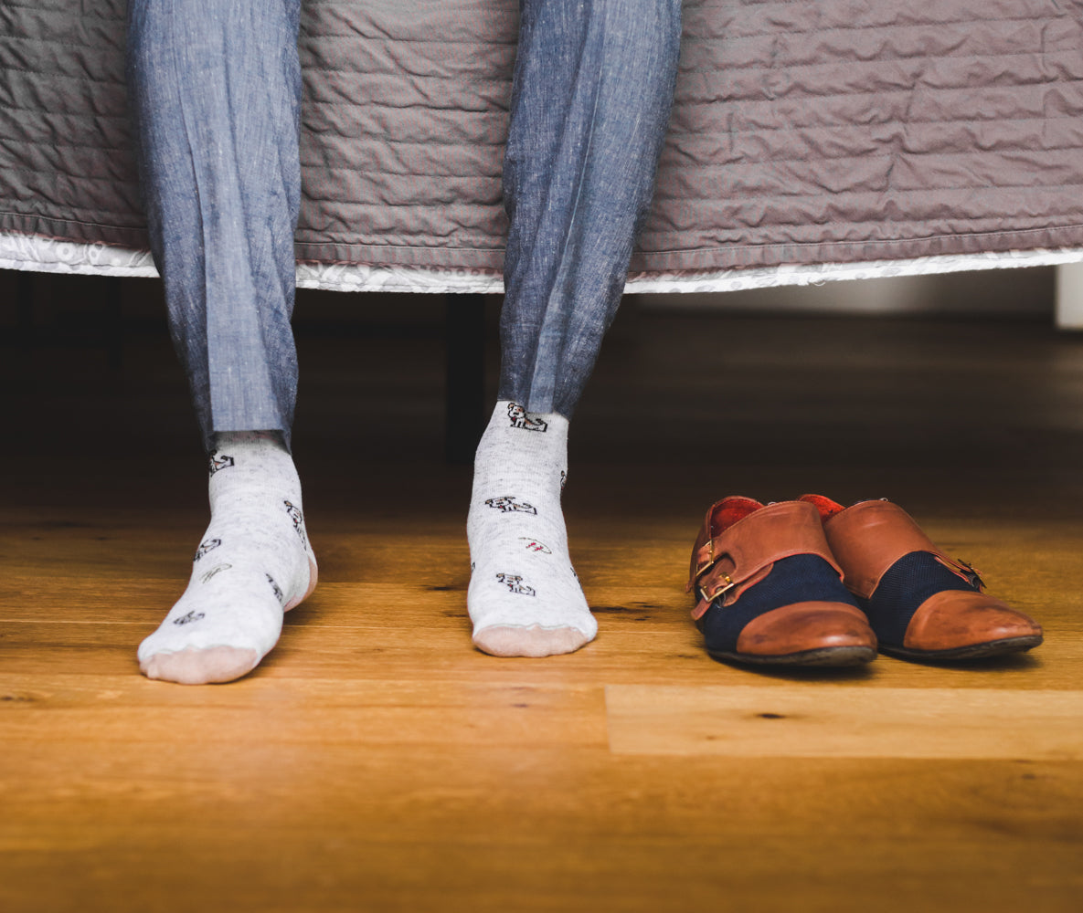 light grey over the calf dress socks with dog prints, brown dress shoes with blue stripe, grey dress pants