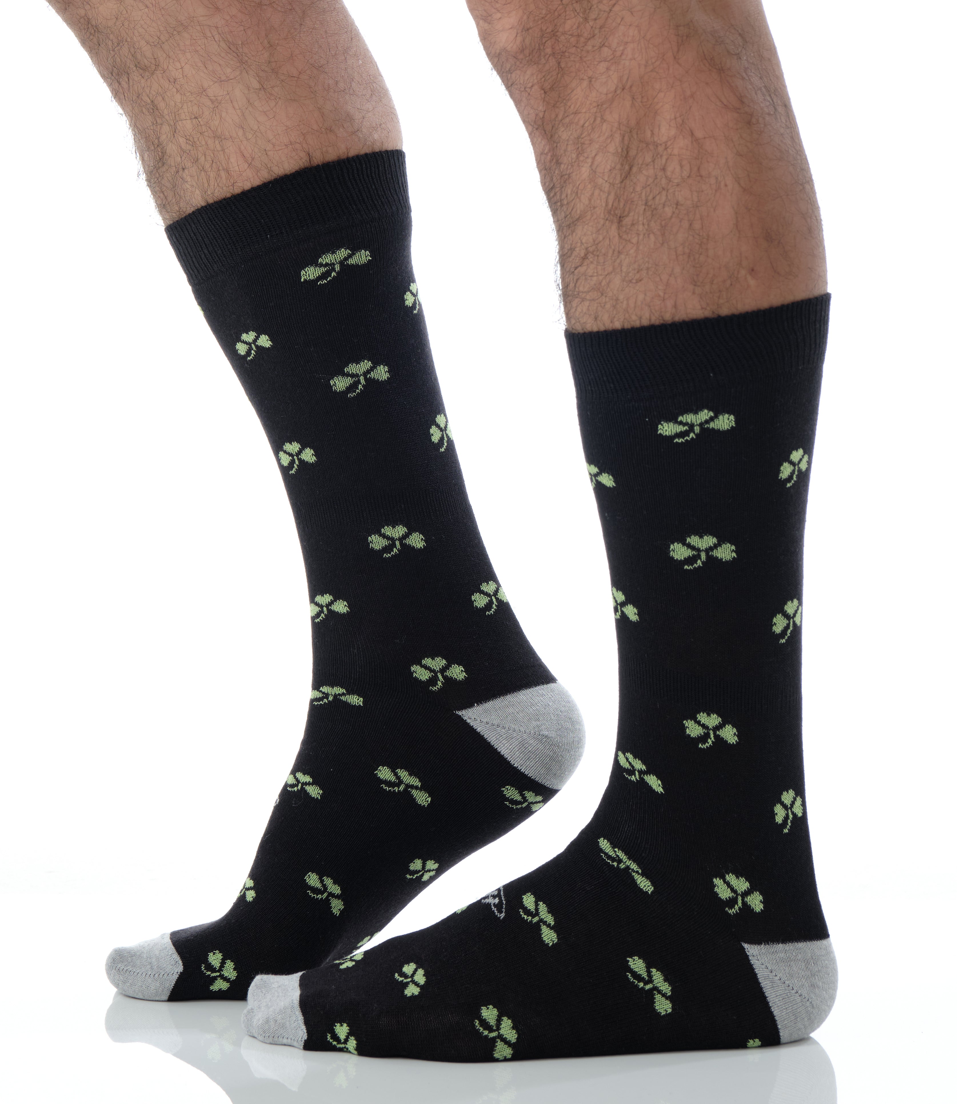 black mid calf dress socks with green clover prints and light grey toe and heel