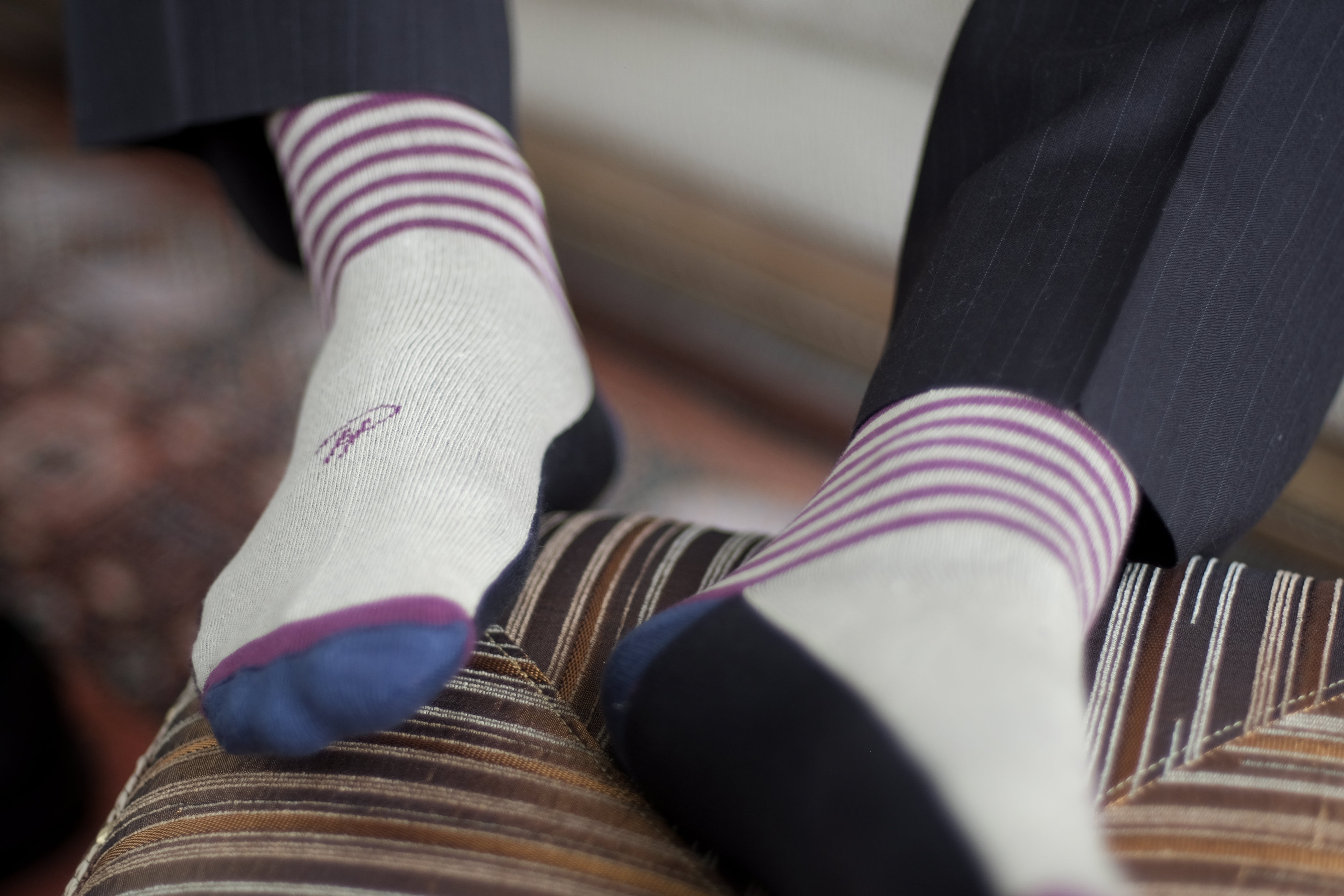 light grey over the calf dress socks with plum stripes navy heel and toe black foot, black dress pants