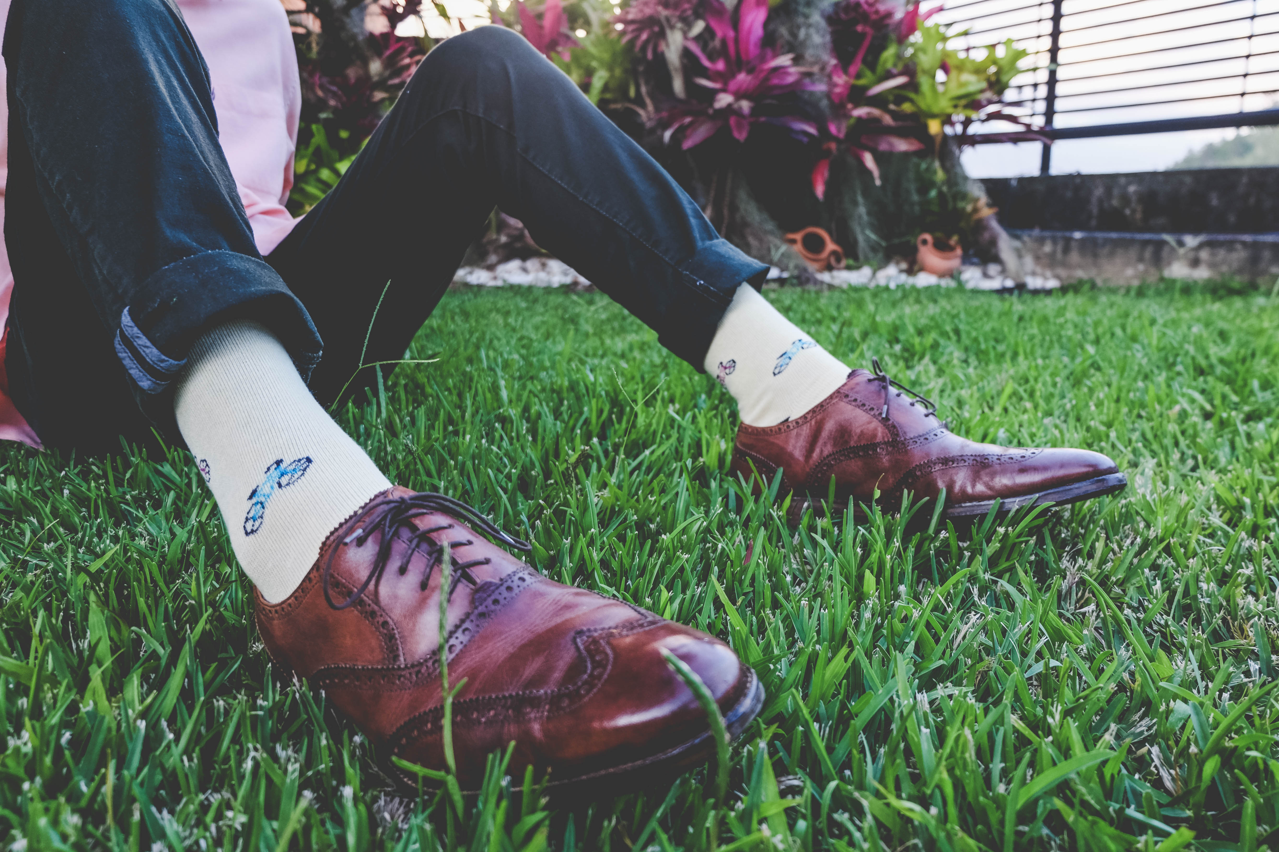 Yellows over the calf dress socks with cycle pattern, brown dress shoes, green pants