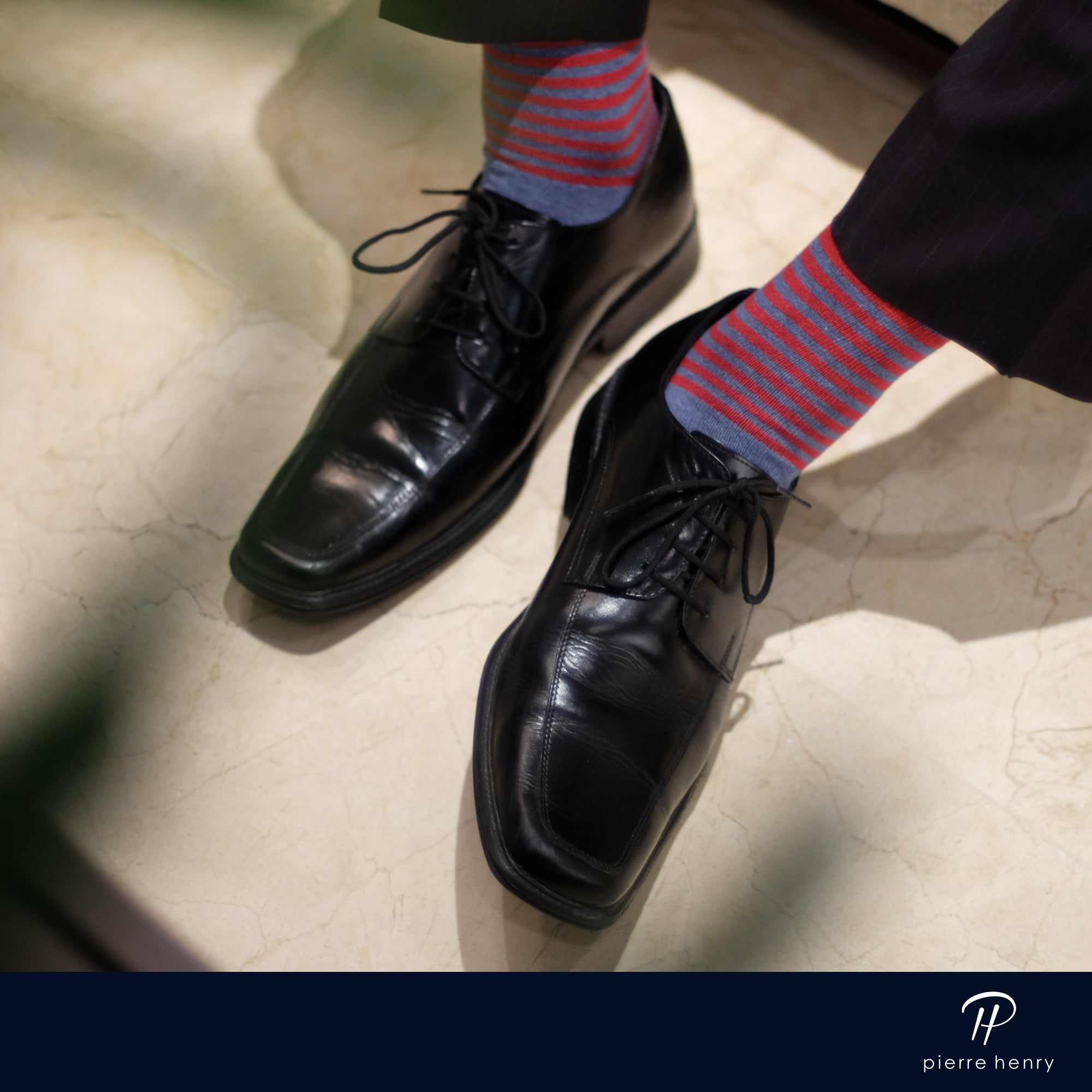 grey and red striped over the calf dress socks, black dress shoes, black dress pants