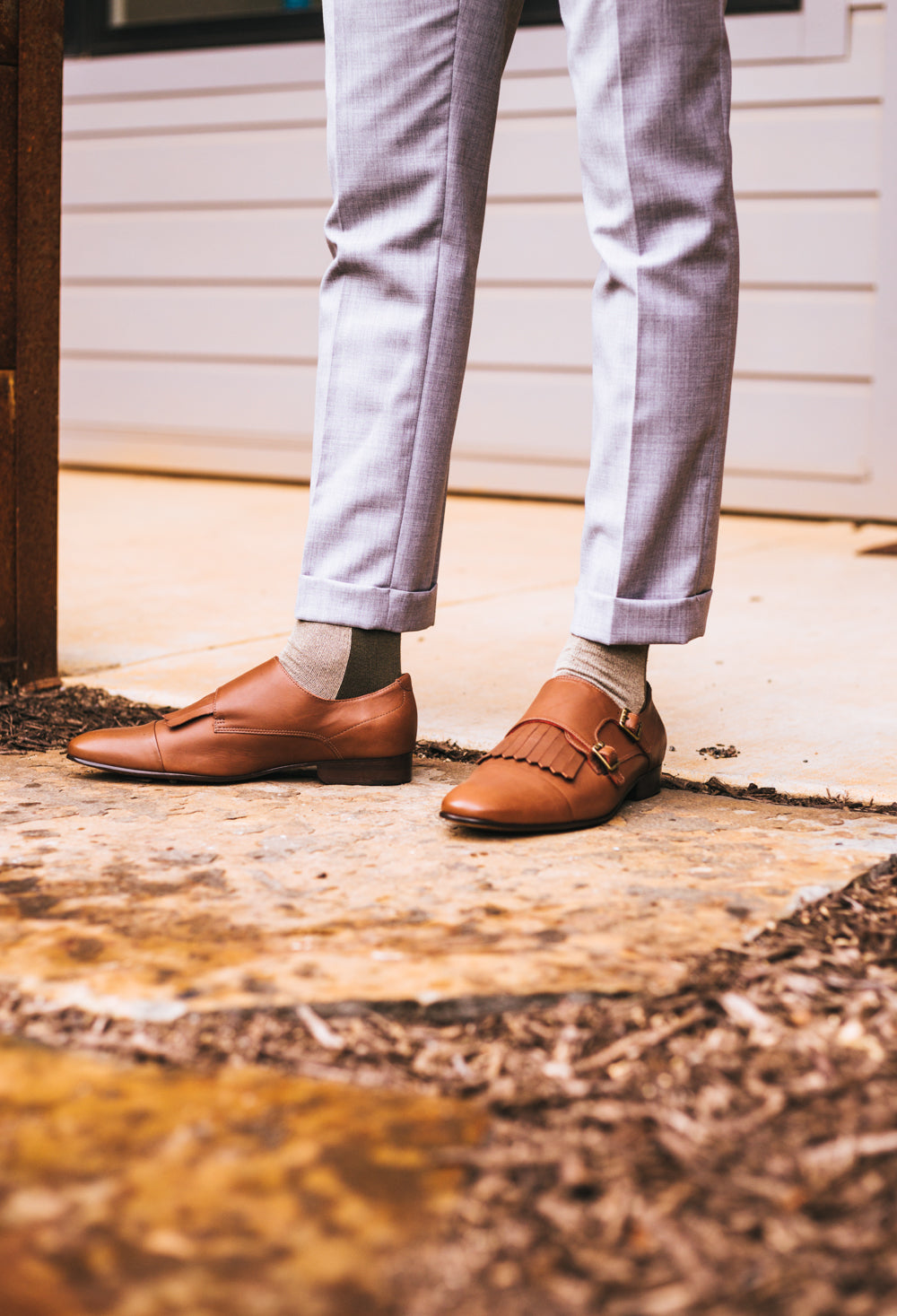 light brown over the calf dress socks with brown stripe, brown shoes, grey dress pants
