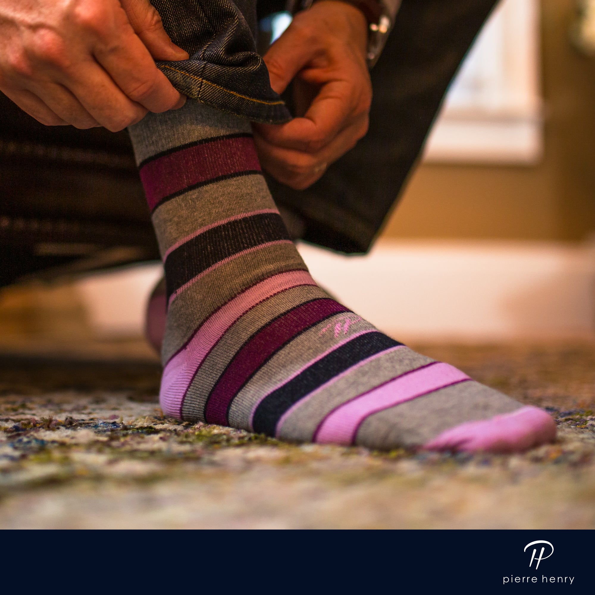 light grey over the calf dress socks with pink burgundy and black stripes, blue jeans