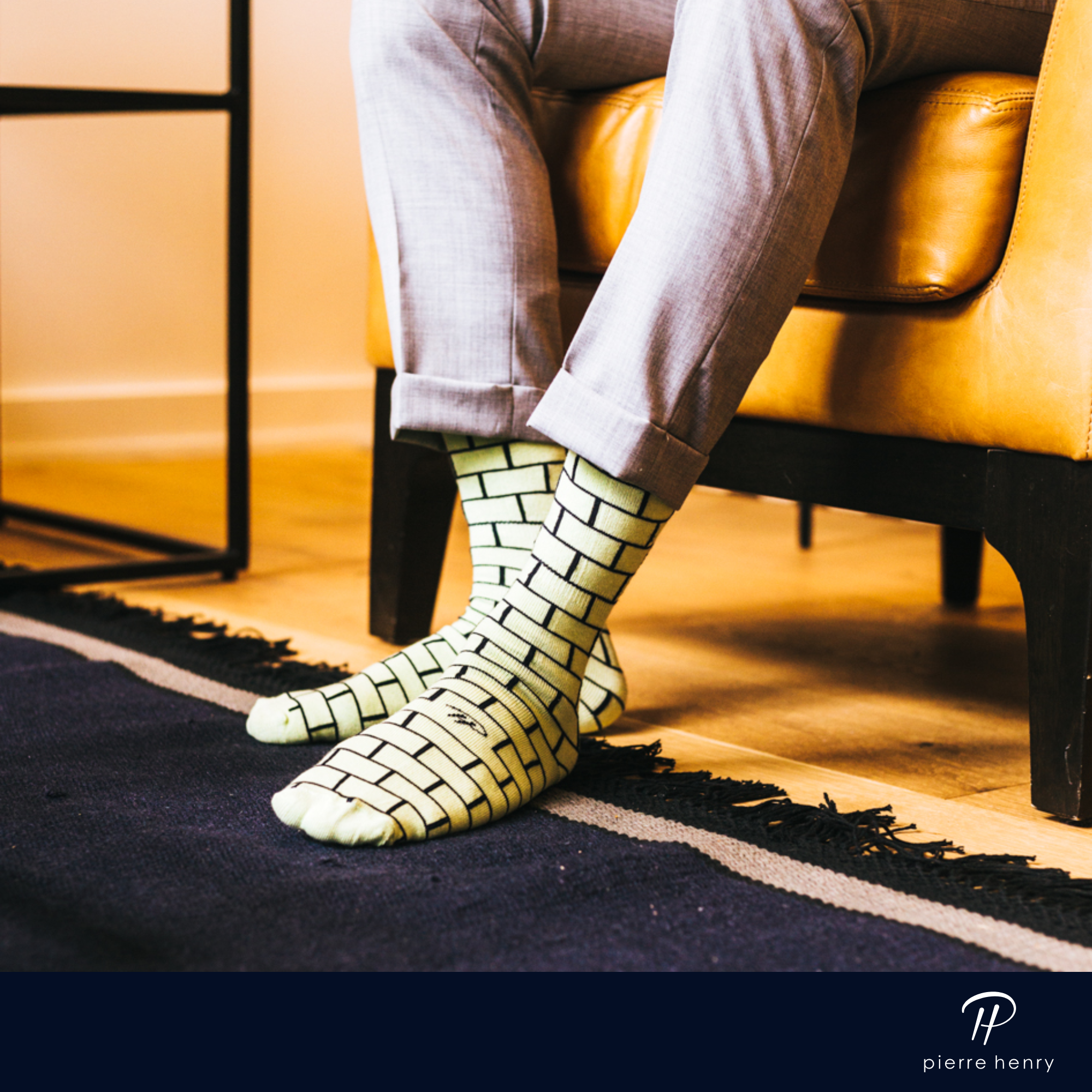 green over the calf dress socks with black brick line pattern, yellow leather chair, plaid dress pants