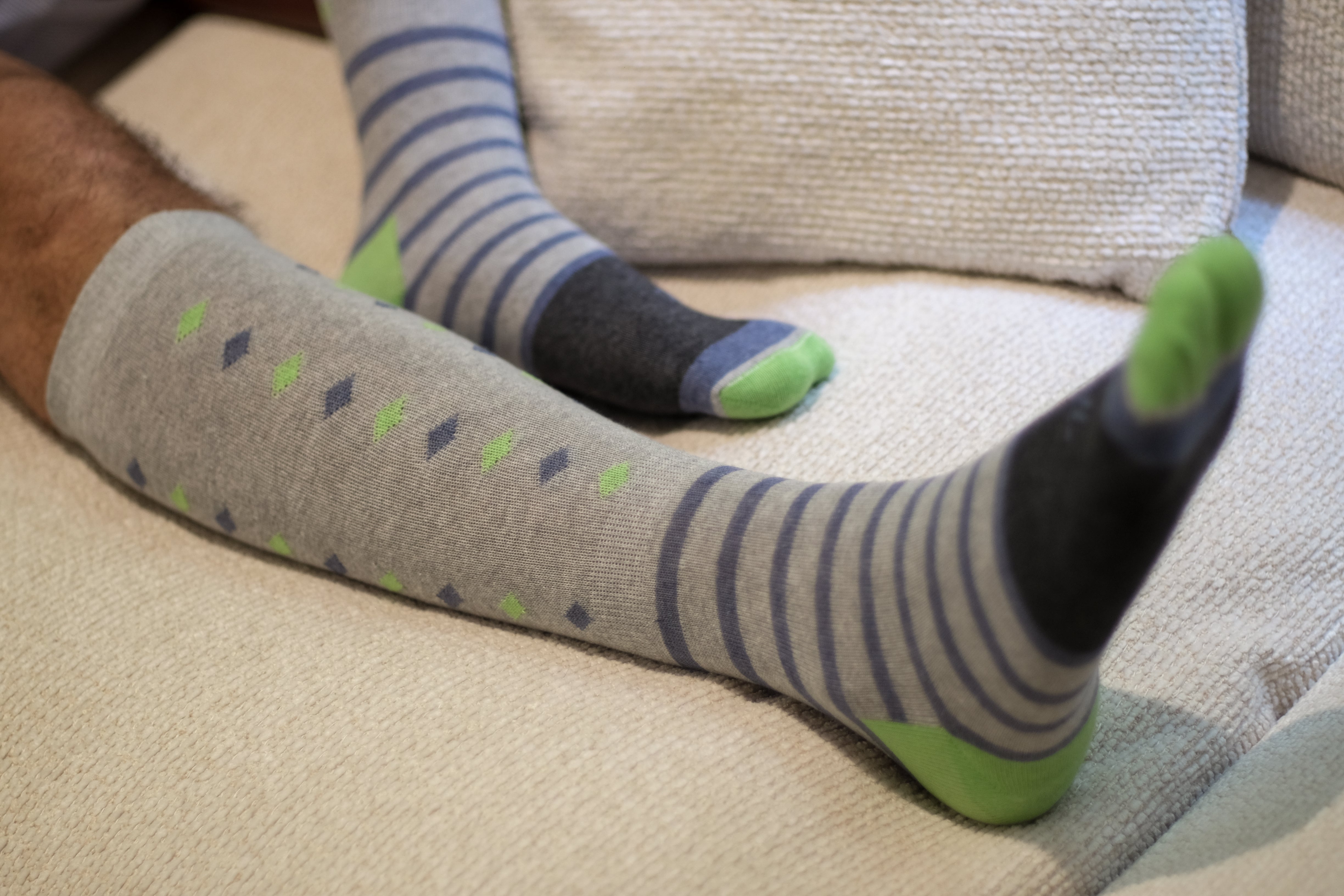 light grey over the calf dress socks with lime green and blue details
