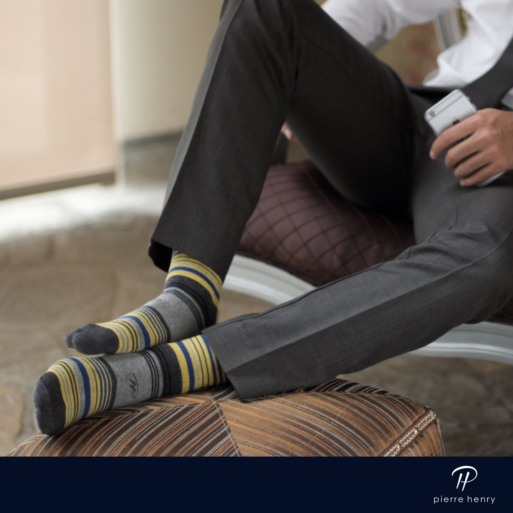 light grey over the calf dress socks with yellows dark grey and blue stripes, grey dress pants