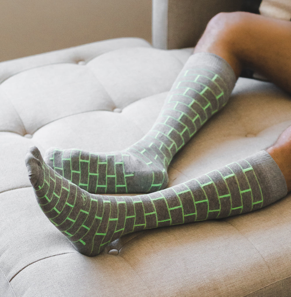 light grey over the calf dress socks with green brick pattern lines