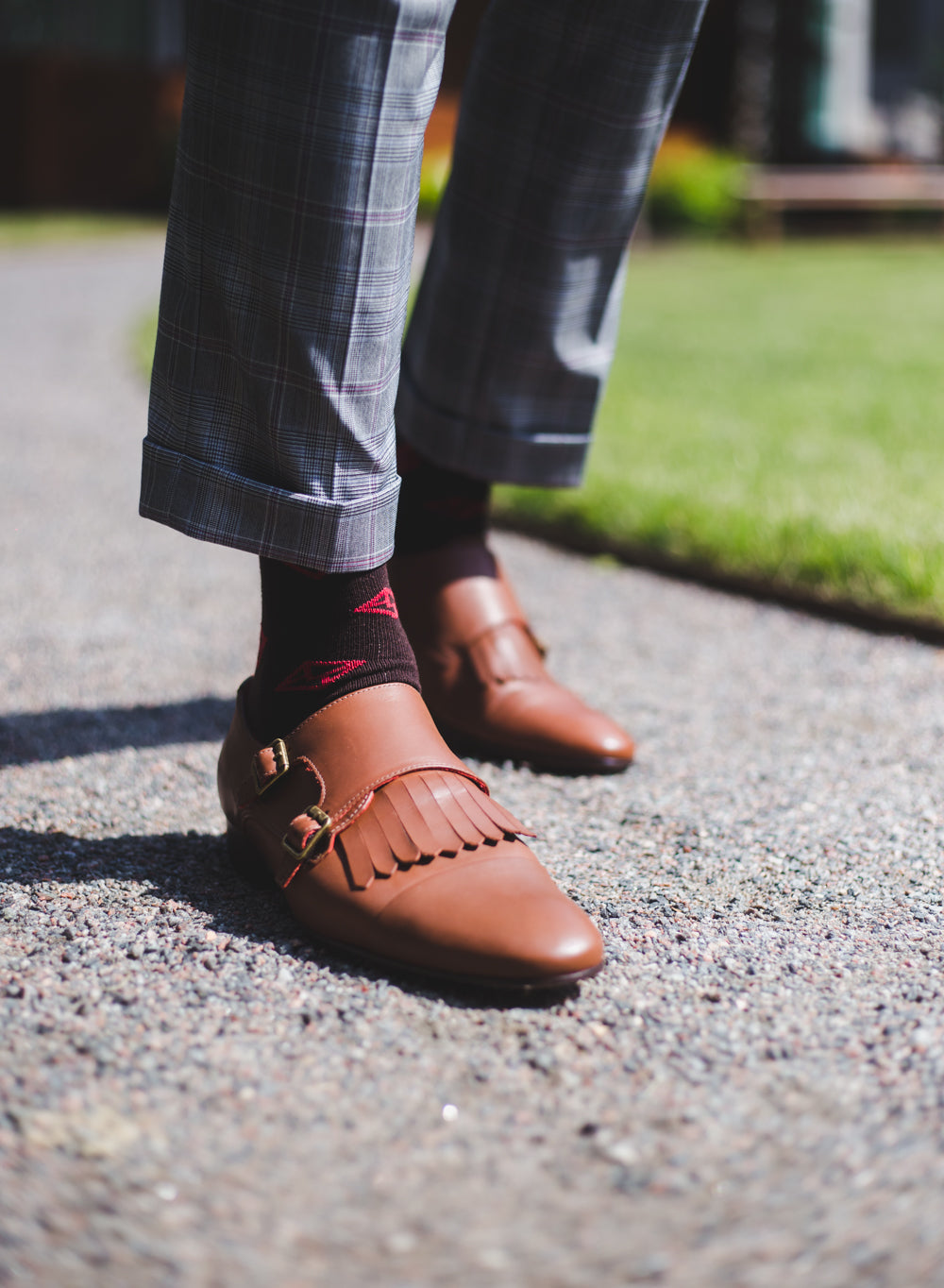 dark brown over the calf dress socks with a red envelope prints, brown dress shoes, plaid dress pants 